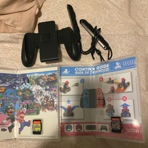 3 month old red and blue Nintendo switch with 2 games